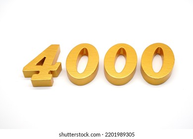    Number 4000 is made of gold-painted teak, 1 centimeter thick, placed on a white background to visualize it in 3D.                                Stock Photo