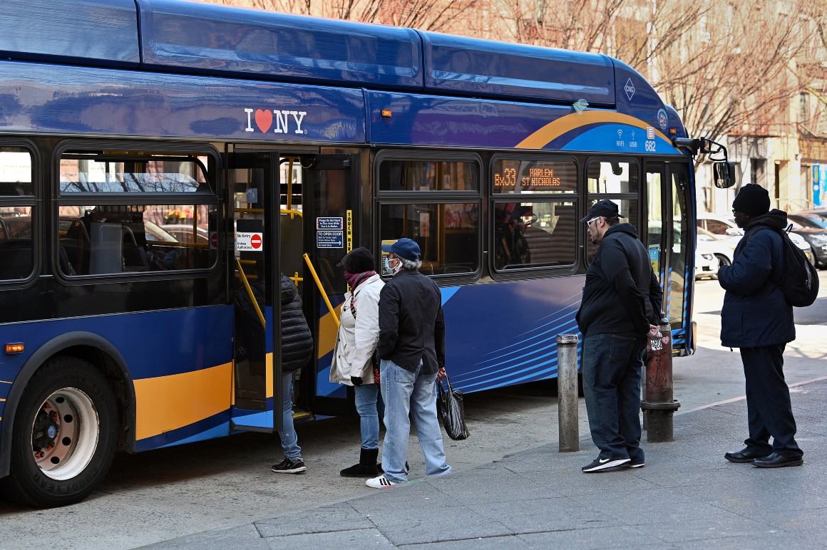 People boarding MTA bus