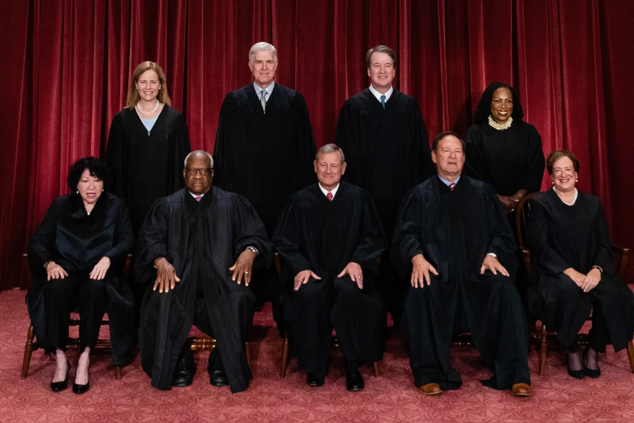 The justices of the U.S. Supreme Court seated and in judicial robes on Oct. 7, 2022.