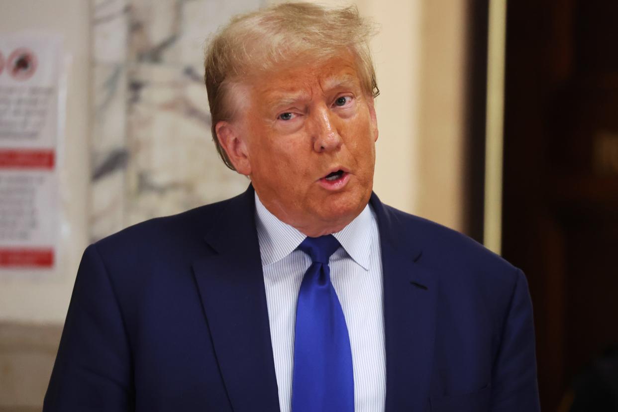 Former President Donald Trump speaks to the media moments after he was fined $10,000 for what Justice Arthur Engoron says is his second violation of a partial gag order at his civil fraud trial at New York State Supreme Court on October 25, 2023 in New York City. The former president may be forced to sell off his properties after Justice Engoron canceled his business certificates and ruled that he committed fraud for years while building his real estate empire after being sued by Attorney General Letitia James, seeking $250 million in damages. The trial will determine how much he and his companies will be penalized for the fraud. (Photo by Spencer Platt/Getty Images) ORG XMIT: 776049516 ORIG FILE ID: 1756514959